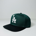 Pro Fit Snapback Trucker Hat – Dark-Green and Black front panel